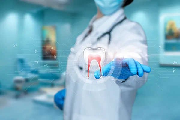 A doctor pointing to a technical drawing of a tooth